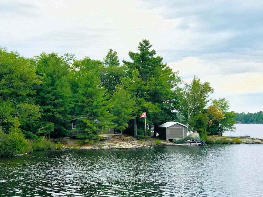 1916 SIX MILE LAKE SHORE ISLAND, Six Mile Lake