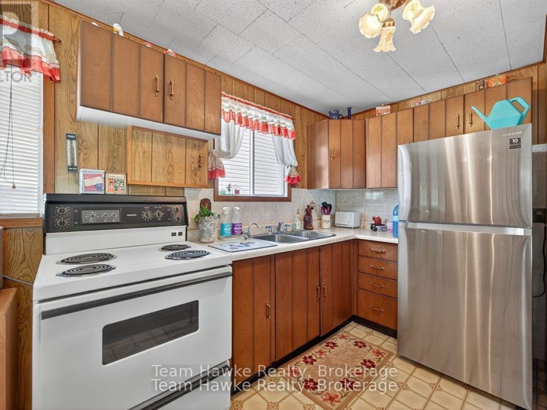 203 WOODLANDS AVENUE, 