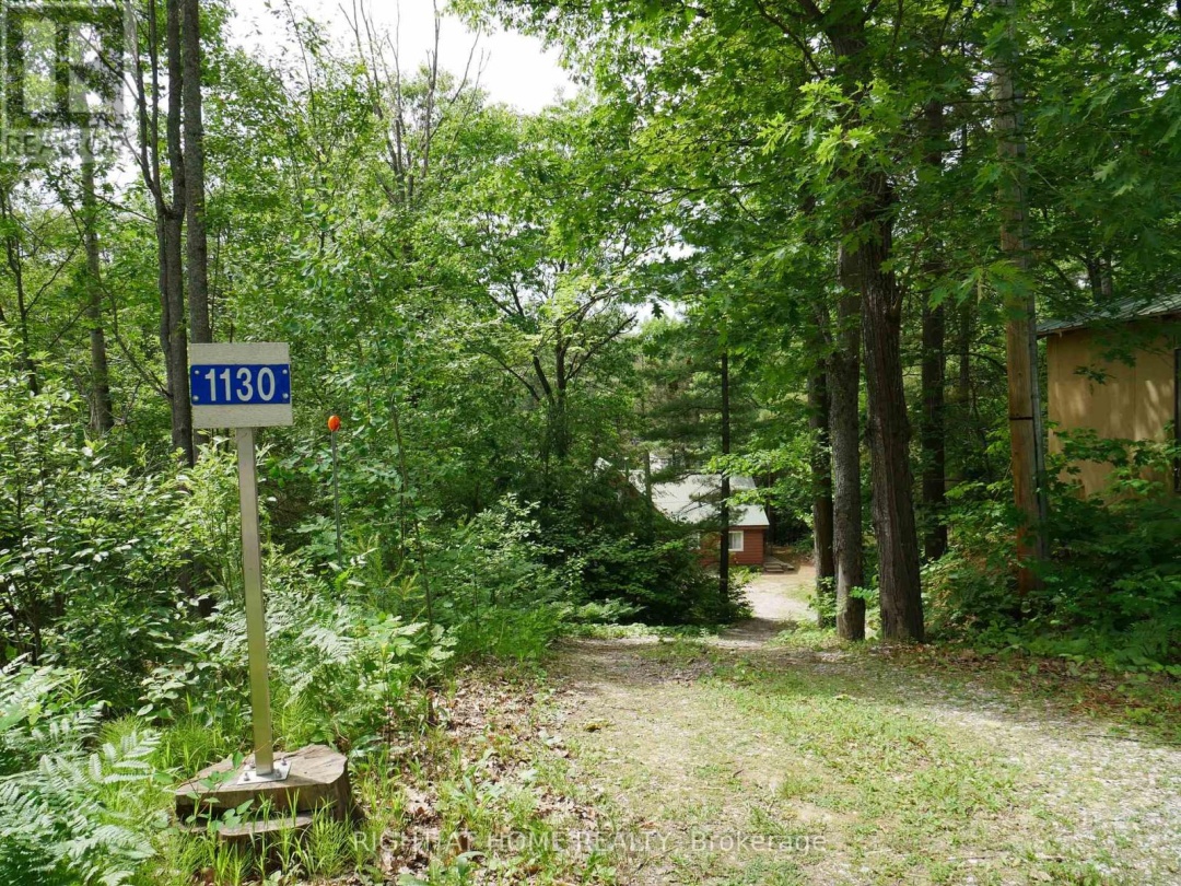 1130 TOWERING OAKS TRAIL W, 