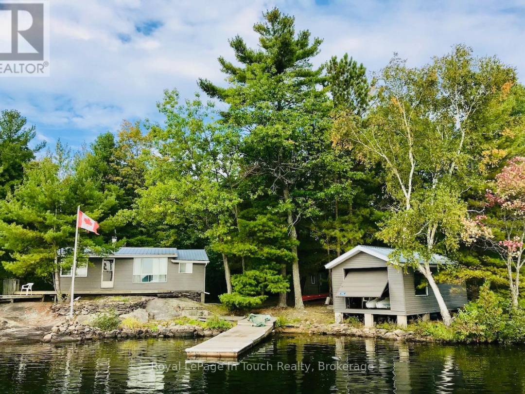 1916 SIX MILE LAKE SHORE ISLAND, Six Mile Lake