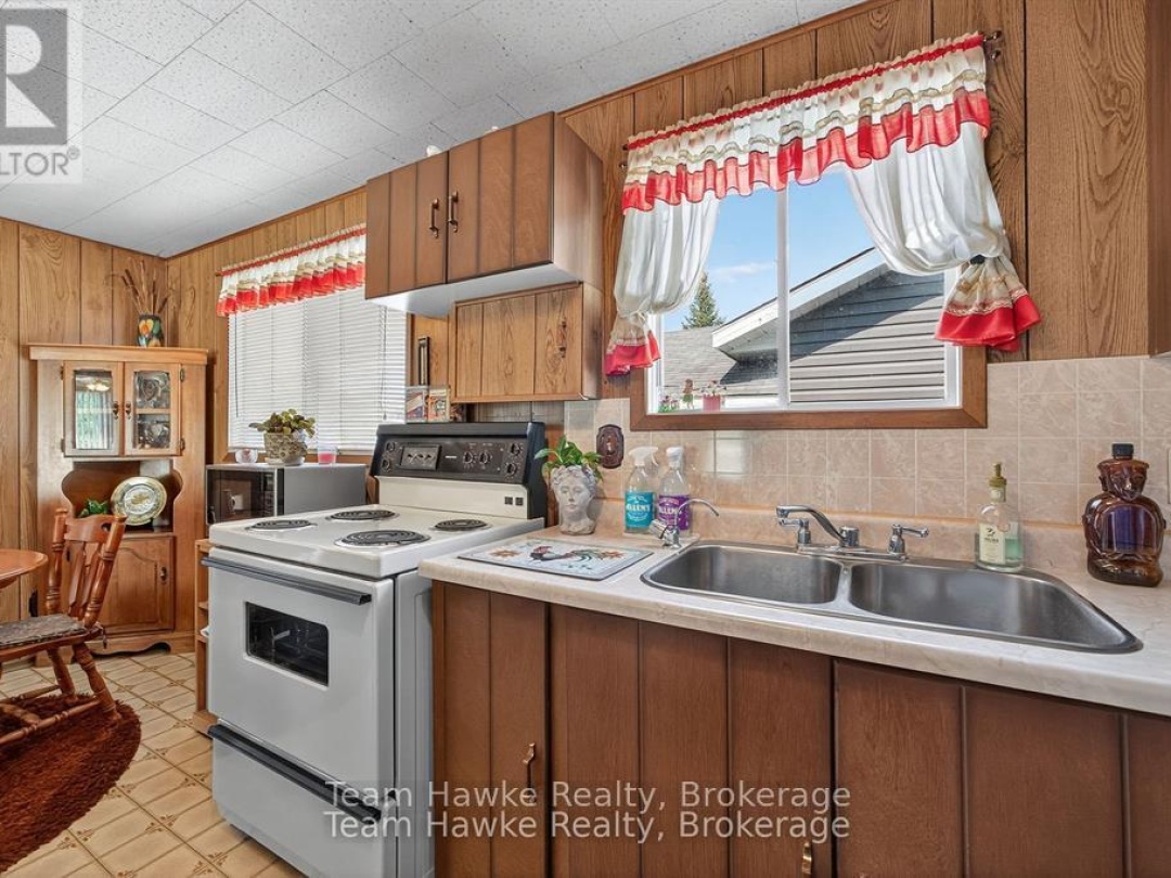 203 WOODLANDS AVENUE, 